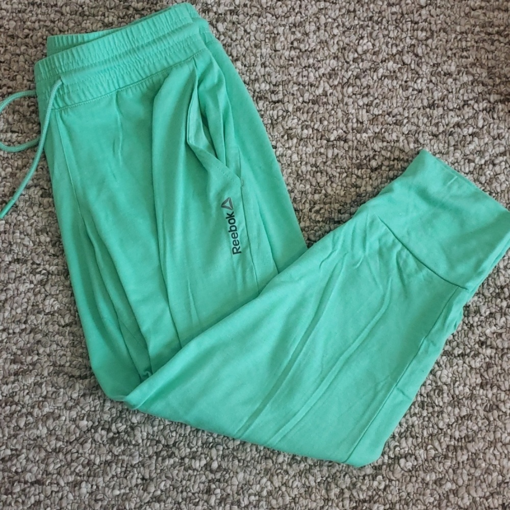 Green Reebok jogger capris